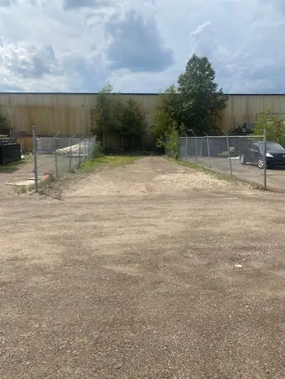 *PENDING* You are viewing a flat outdoor commercial storage lot located behind the building at 6613...