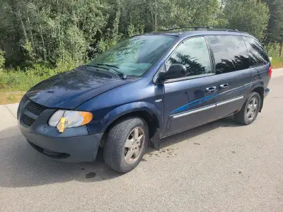 This larger minivan is more like a cargo van with the rear seats taken out, two sliding side doors,...