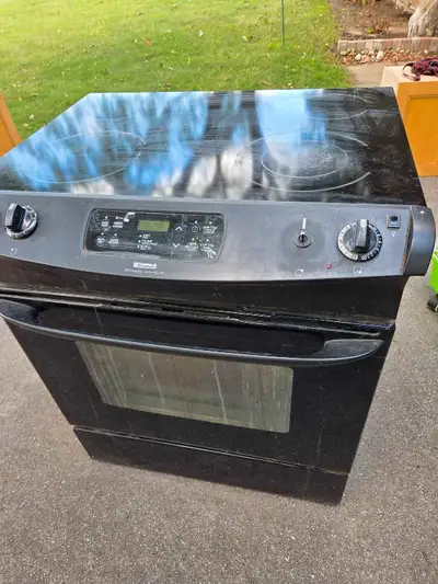 Used electric stove Two burners working fine - the other two are a bit finicky. Oven works fine. OBO