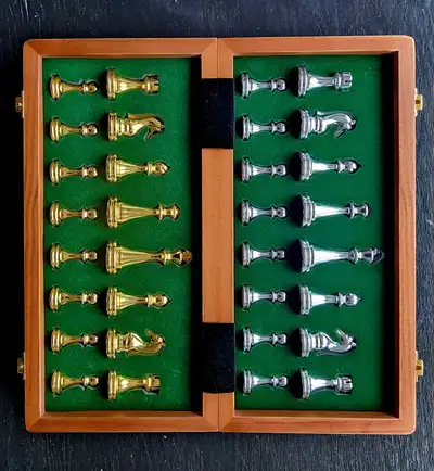 Beautiful Vintage Metal Chess Set with folding Wooden Board. It's a vintage piece from Yernea, with...