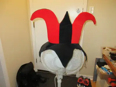 adult red and black Jokers/Jesters hat was a gift never used excellent quality 3 jingle bells on 3 p...