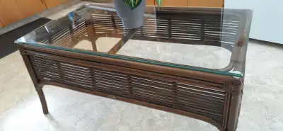 Coffee and end table in very good condition. Each has a glass top. Originally bought at Beck’s Home...