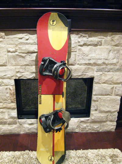 Santa Cruz Backside 142cm Snowboard with Salomon Bindings. The board has some nicks and chips along...