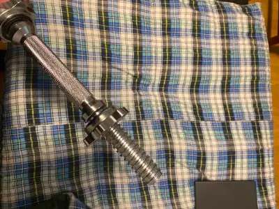 Dumbbell handle for added plates., View more