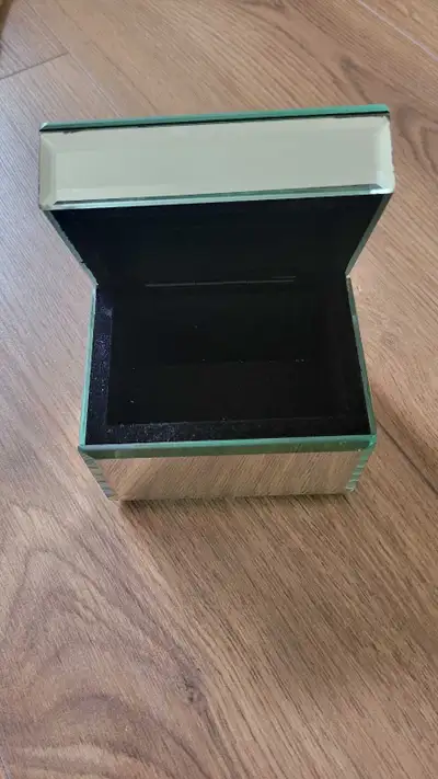 Small mirror jewelry box, measures 3 in × 4 in × 3.5 in. Good condition with minor marks on edges. $...