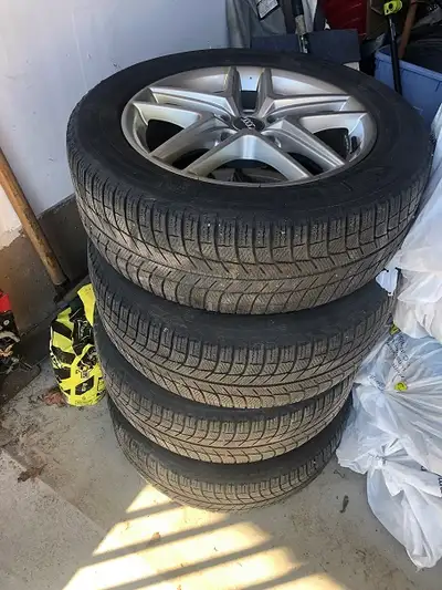 Selling 4 Michelin X-Ice Winter tires ( 225/55R17). Mounted on 5 bolt Alloy Rims. Bolt Patten 5 X 11...