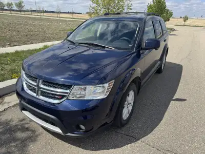 2018 Dodge Journey SXT – Blue, 7-seater AWD with a powerful 3.6L V6 engine. Clean interior, roof rac...