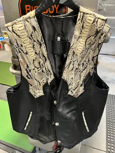 2 biker vests with snake skin. Size 46 & 48! “If the ad is up, it’s still available!”