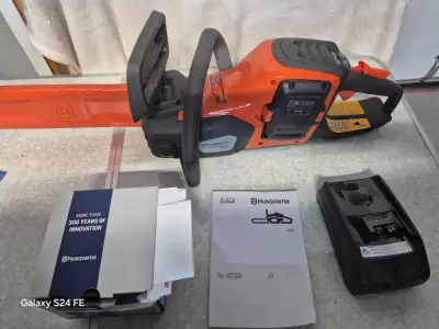 Brand new Husqvarna 225I Electric Chainsaw for sale. Saw comes complete with a battery pack and a ch...