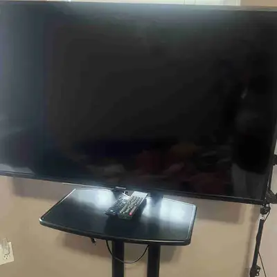 Hisense tv with tv stand, View more