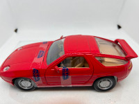 Rare 1/24 Diecast Porsche 928 S4 1987 in mint condition.