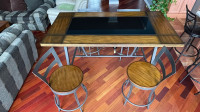 Table with 4 swivel stools like new