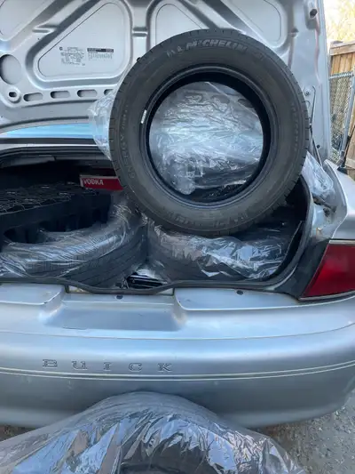 Set of 4 Michelin tires - lightly driven - excellent tread - ALL SEASON - Size is 205 - 60 - R16 - R...