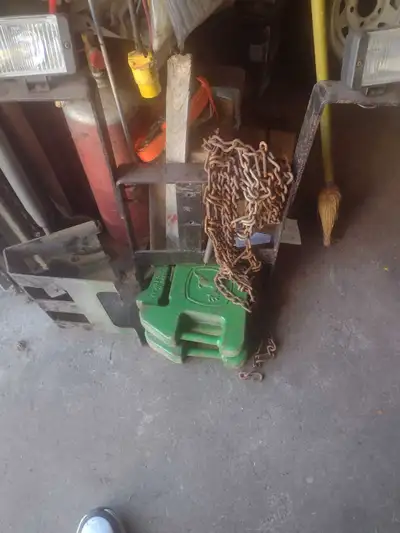 I am selling a used garden tractor, chains and weights for L125 John deere Additional Specifications...