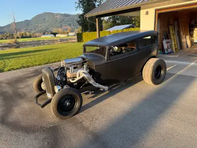 1932 Ford Sedan hotrod. This is a custom built rod .As you can see it was done very nicely. The fram...
