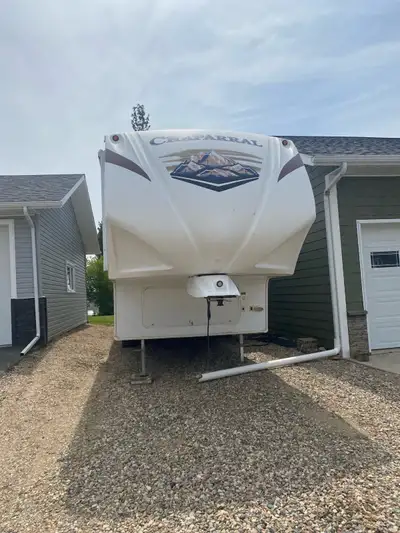 2012 Chaparral 32.5 ft. Fifth Wheel Camper. 3 slides- 2 large , 1 bedroom, Electric fireplace,TV,Ste...