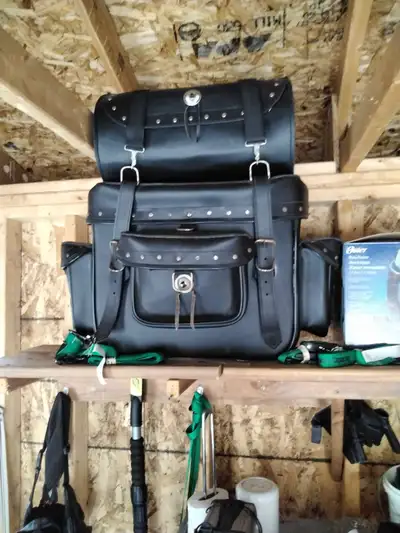 This is a used motorcycle leather bag for sale, perfect for storing your essentials on the road. The...