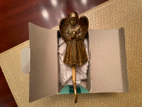Brass angel stocking holder