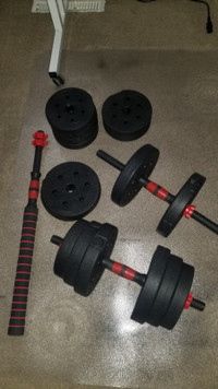 Adjustable dumbbell weight set with bar. Free weights.