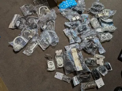 Refresh your window treatments with this extensive lot of assorted drapery and curtain hardware, inc...