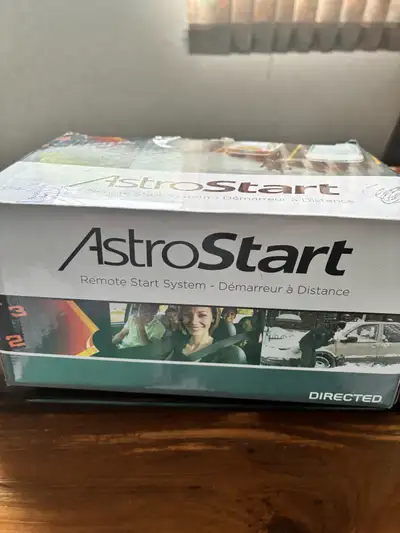 New Astro vehicle starter. Two remote controls.