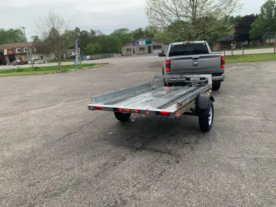 Single just over 5 feet long by just over 8 feet ATV trailer in great shape new : springs,shackles,l...