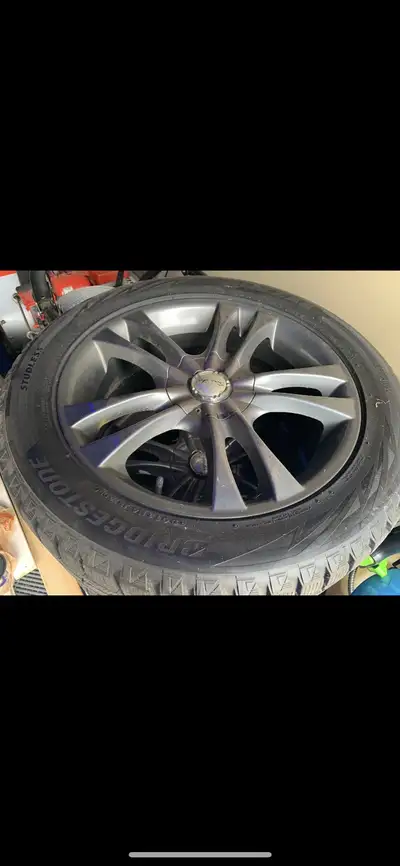 Blizzack 225/50/R17 winter tires (virtually new) mounted on aluminum rims with two (2) set of 5 bolt...