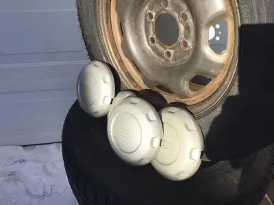 Four (4) Goodyear Ultragrip Ice, winter tires. Size LT245-70R17. Mounted on Ford 6 bolt steel rims....