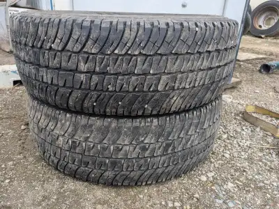 2 Used LT275/65R20 Michelin Defender A/T2 Tires. Tires are in good condition with one at 65-70% and...