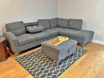 Brand new Sectional Fabric Storage couch with ottoman, View more