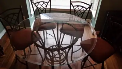 circular glass table plus four chairs, View more