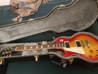 2 LEFT HANDED (NEAR VINTAGE EPI AND ARIA PRO 2) GUITARS.