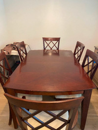 Beautiful Solid wood Dining table with leaf and seating for 8.