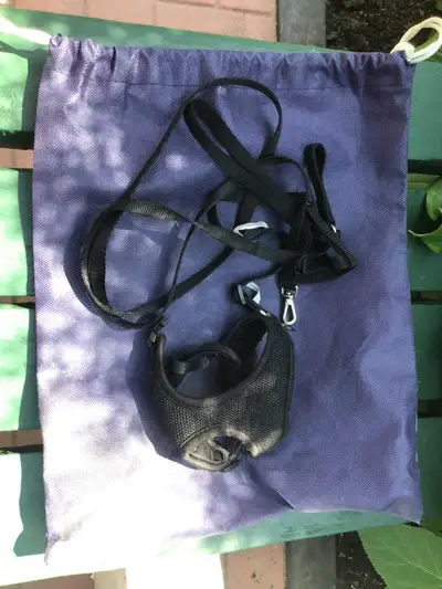 This is a used, small mesh dog leash and harness designed to comfortably restrain your furry friend,...