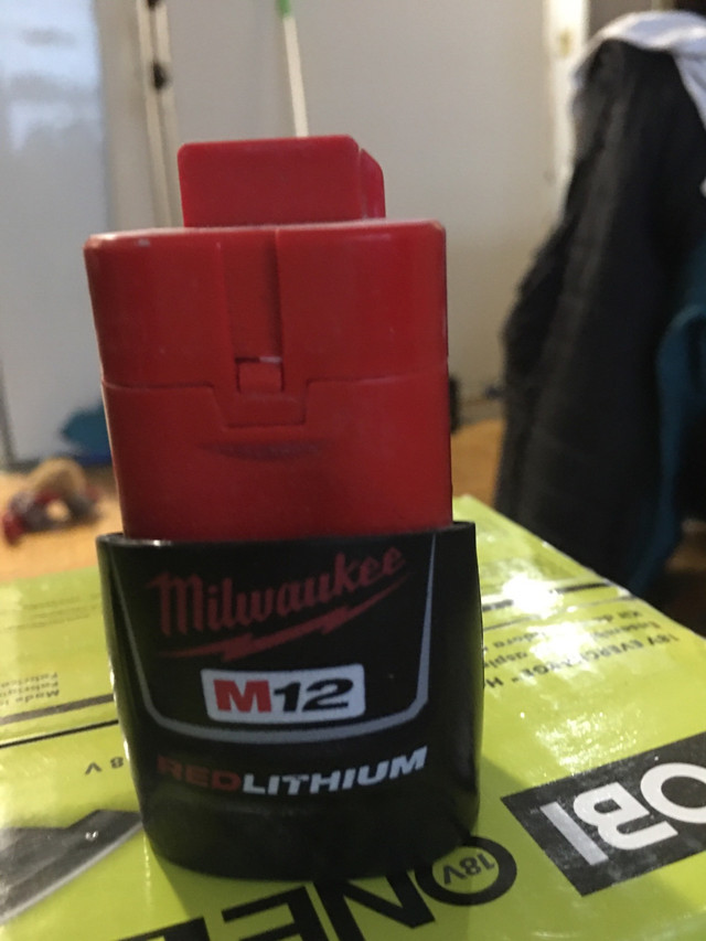 Milwaukee Charger and battery for heated jacket.  in Other in La Ronge