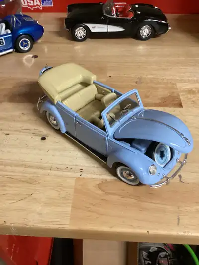 2 Volkswagen Beetles 1/18 scale, View more