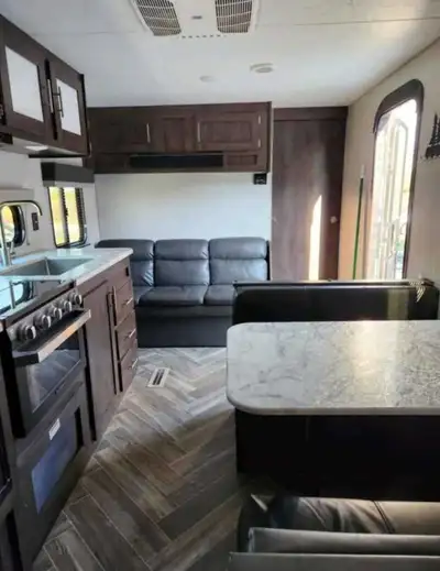 I have a 2021, 26ft Sportsman camping trailer with bedroom and double bunk beds. Can sleep approx 6-...