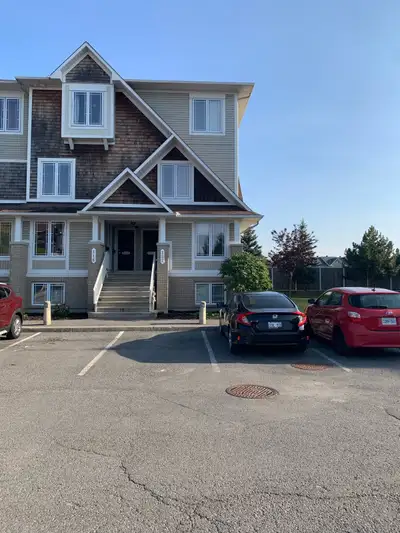 Beautiful end unit terrace home, lower unit. Two bedroom with ensuite full bathroom. Powder room on...