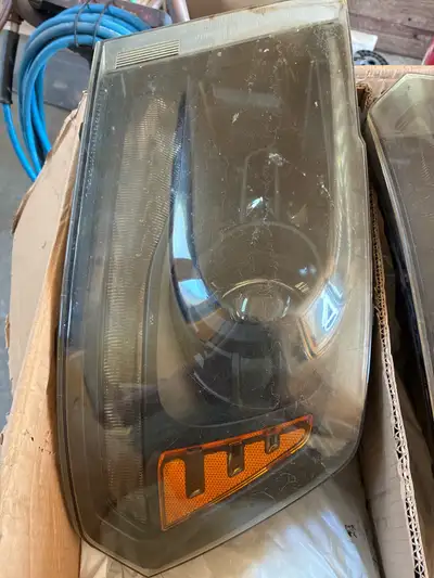 From a 2014 but will fit multiple years. Halogen over led. Worked fine when removed. Just show a lit...