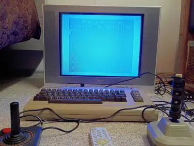 BMC64 gaming system with Raspberry Pi 3 Model B which has been connected to a real C64 keyboard and...