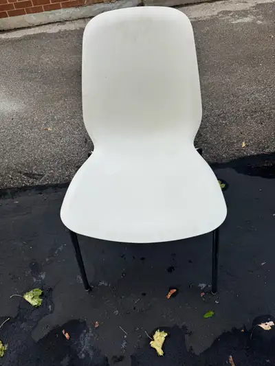 White molded plastic dining chair with chrome metal legs, View more