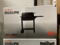New Original PK Grill and Smoker. Still in the box.