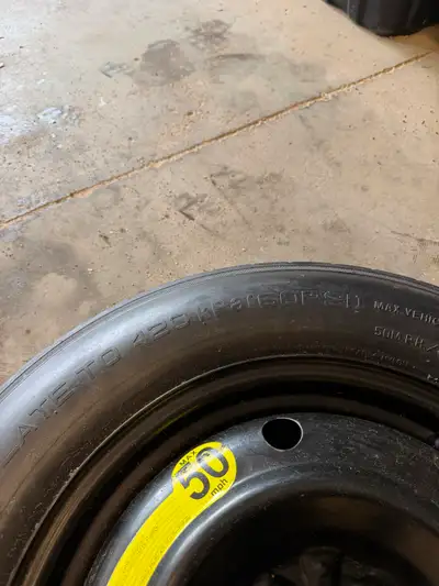 BRAND NEW / NEVER USED OEM DONUT SPARE – T155/90D16 Never used compact spare tire and steel wheel. T...
