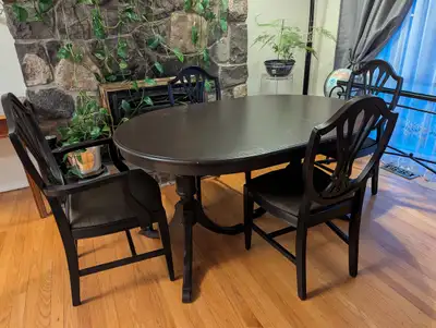 All wood Dining Set. Wood table and four chair slightly used. $150