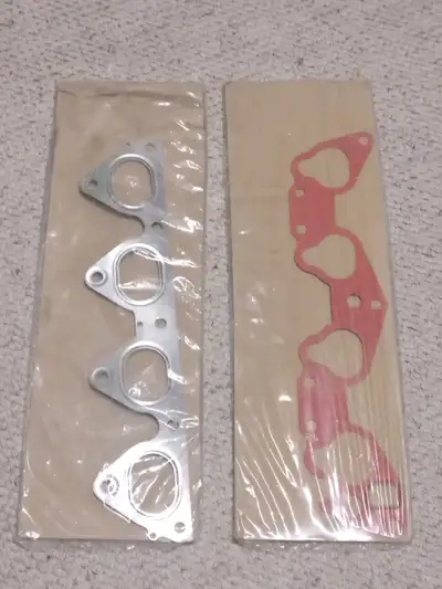 For sale is a pair of NOS Honda OEM intake and exhaust gaskets. I believe these are for the D series...