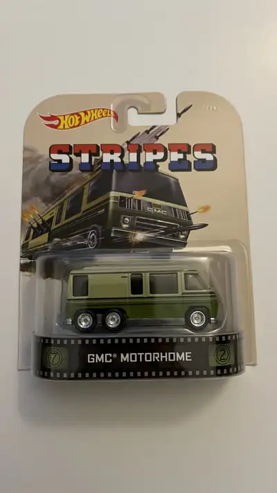 I'm selling a mint condition, Hot Wheels GMC Motorhome die-cast car from the Stripes series. This co...