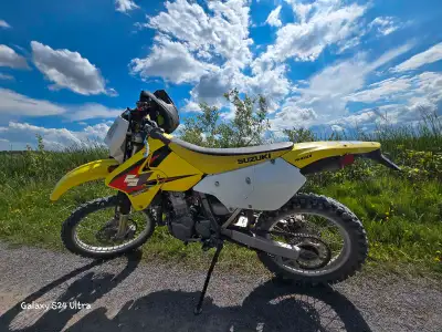 Looking to sell my 2005 Suzuki DRZ400E, a versatile dual-sport motorcycle perfect for both on and of...