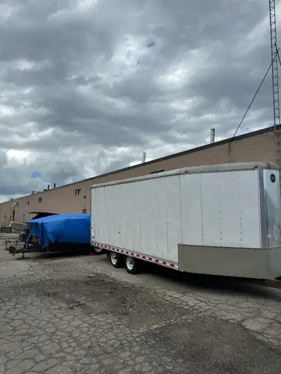 Enclosed trailer perfect for atvs snowmobile or heavy equipment 7x18x5x23’ drive in drive out. 2 ram...