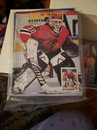 Box of old hockey and baseball books