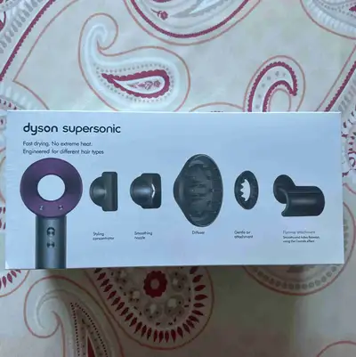 New sealed Dyson Supersonic Haie dryer with 5 styling attachments. Selling for $235 Pickup only. Tha...